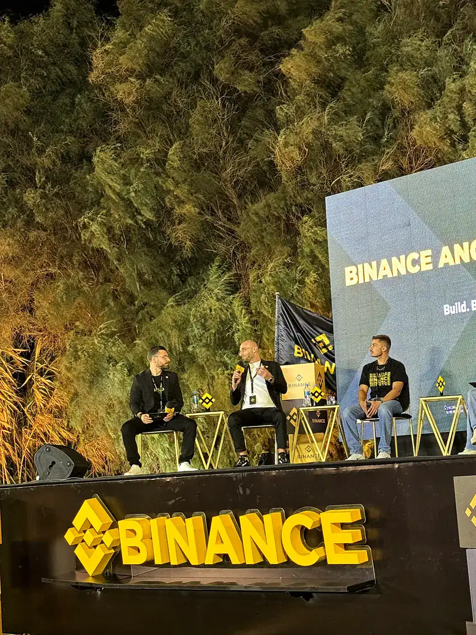 Blockchain Sam on stage at a Binance panel