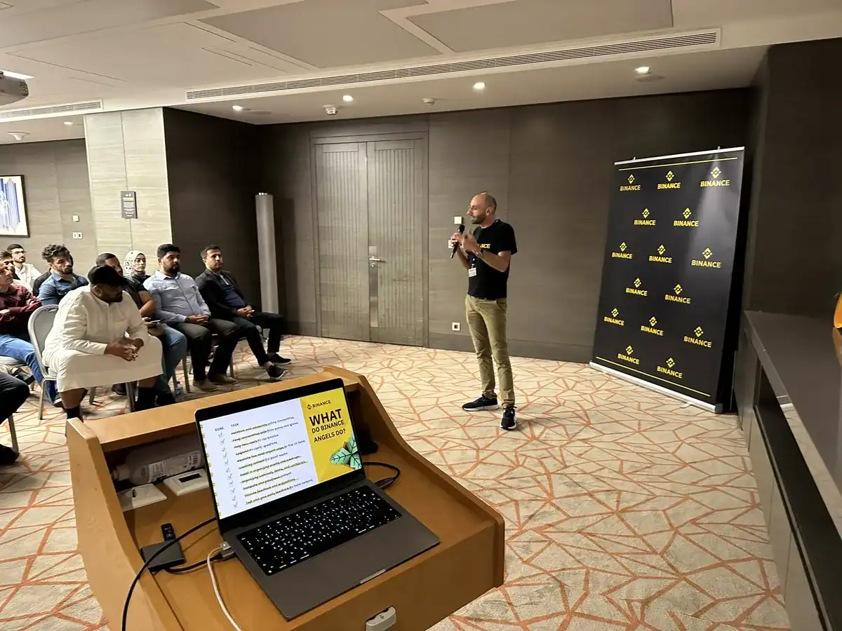 Sam teaching a crypto workshop at a university